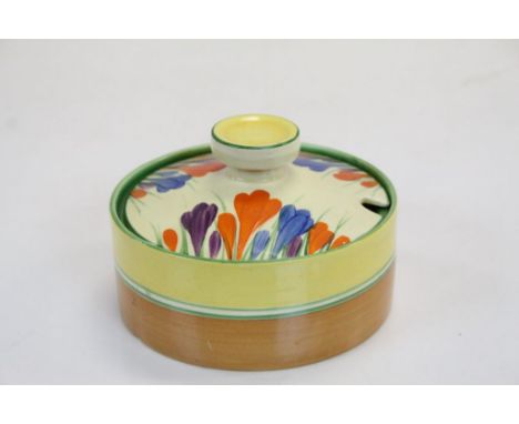Clarice Cliff ceramic Preserve jar with lid decorated in "crocus" pattern, approx 10cm diameter
