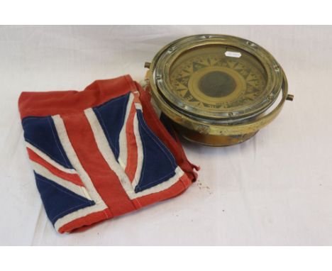 A Vintage Brass Ships Compass By D. Pearson &amp; Son Of Hull Together With A Red Ships Ensign Flag.