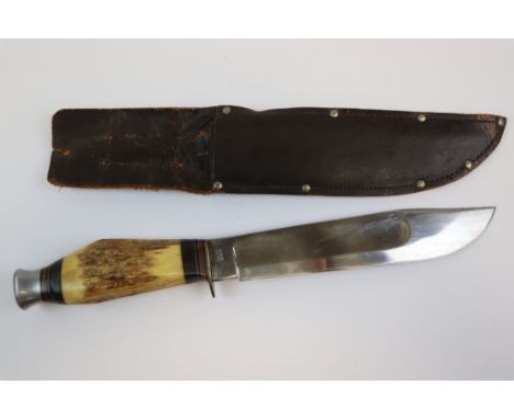 A Vintage William Rodgers Bowie Style Hunting Knife With Leather Sheath.