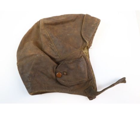 A Vintage World War Two Period Leather Flight Helmet.