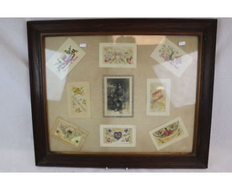 A World War One / WW1 Framed Collection Of Embroidered Silk Postcards And Portrait Photograph Of A Soldier.