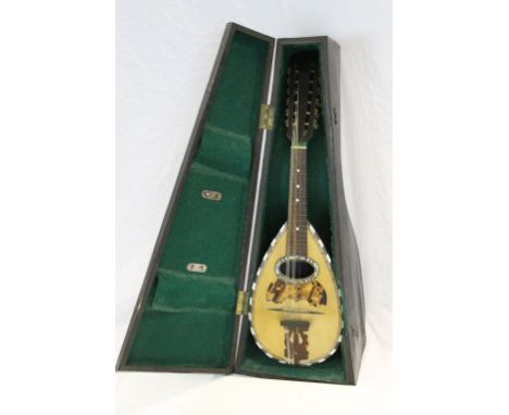 A cased vintage lute with label reading Carlo Ricordo Napoli N1001