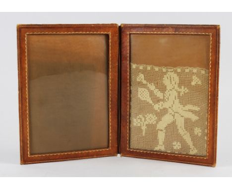 Badminton - Cotton Patch depicts a child with early bat and shuttlecock, maintained within leather wallet with plastic cover,