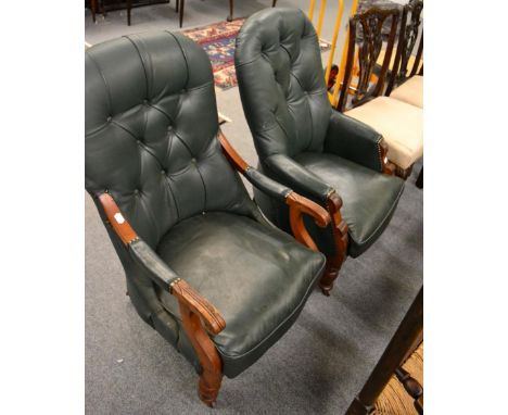 A gentleman's button back leather arm chair together with another button back chair in matching leather