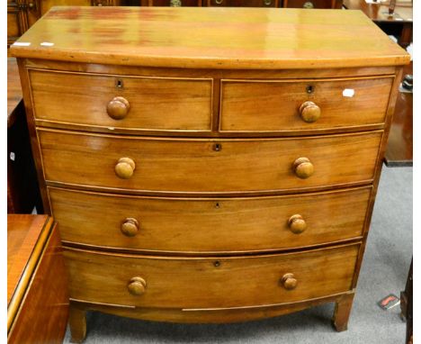 A George III mahogany bow fronted four height chest of drawers