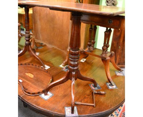 A mahogany tripod table, rectangular top and quadruple legs 