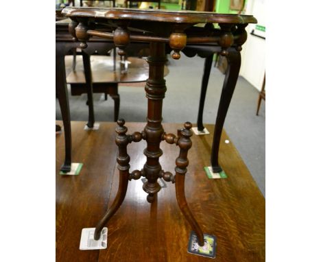 A 19th century walnut tripod table 