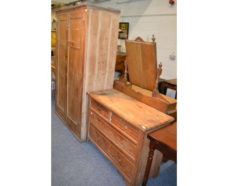 A three height chest of drawers, a pine double wardrobe and a pine three height chest