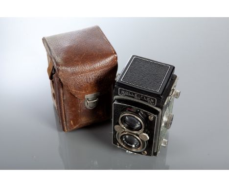 FRANKE & HEIDECKE ROLLEIFLEX TWIN LENS CAMERA
no.1025779, with Carl Zeiss Jena Tessar 1:35 f7.5 lens and tan pig skin case, 1