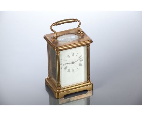 EARLY 20TH CENTURY FRENCH BRASS CARRIAGE CLOCK
with cylinder platform escapement and four column case and enamel dial, 14cm h