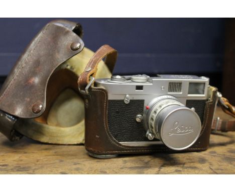 ERNST LEITZ LEICA M2 CAMERA 
no.970306, with f5 1:2 lens, 14cm long 
