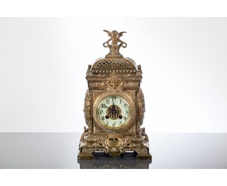 EARLY 20TH CENTURY FRENCH BRASS MANTEL CLOCK
with enamel Arabic dial, striking on a gong, 35cm high