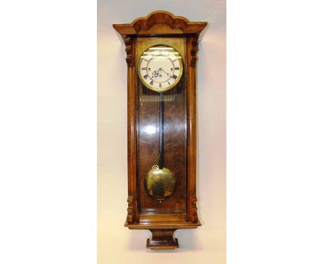 19TH CENTURY VIENNA WALNUT REGULATOR CLOCK
with enamel Roman dial, and three weights,104cm long
