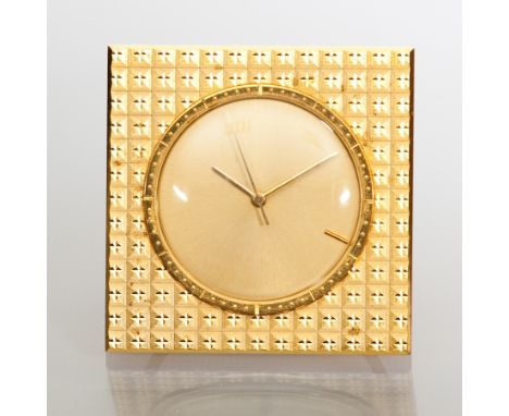 JAEGER LE COULTRE MEMOVOX ALARM CLOCK
c.1960s, the dial without numerals, in a square gilt case with engine turned decoration
