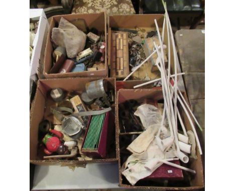 Five boxes containing a quantity of miscellaneous items, to include: smoking requisites, a tin plate clockwork monkey, drivin