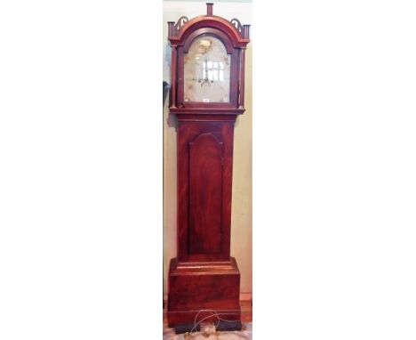 A 19th century mahogany longcase clock, having painted arched dial and bearing the name Chaplin's, Bury.