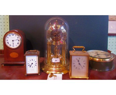 A collection of five miscellaneous clocks, to include: Edwardian mahogany and shell inlaid mantle clock, anniversary clock, b