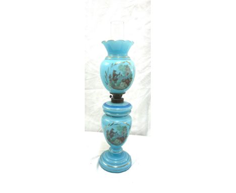 Vintage blue glass oil lamp, height approximately 24 inches 