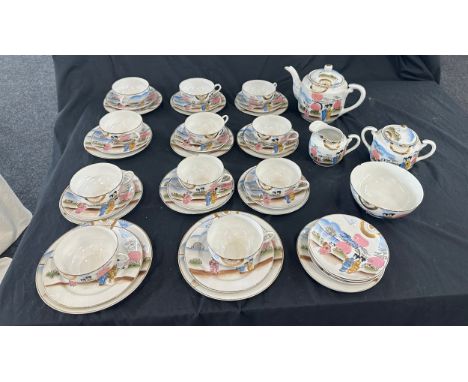 Oriental hand painted tea service with marks to base to include 11 cups complete cups and saucers, tea pot, milk jug etc 