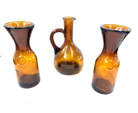 Three Vintage hand blown amber coloured glass a pitcher and two others largest measures approx 9.5 inches tall 
