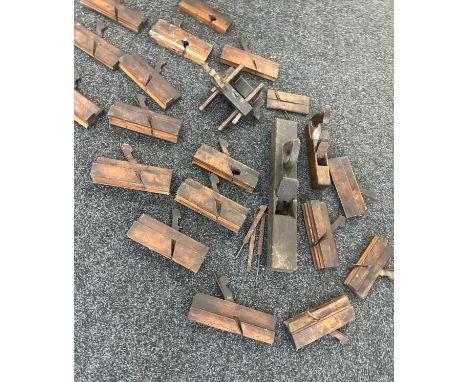Large box of antique wooden moulding planes and other wood working tools 