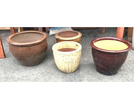 4 ceramic garden pots, largest measures approximately 9inches tall 12.5 inches diameter 