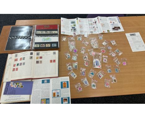 Selection of assorted vintage and later stamps from various different countries in stamps albums and first day covers 