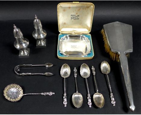 A collection of Edwardian and later silver, comprising five Edwardian apostle spoons, 10cm long, a tea strainer, 10.5cm long,