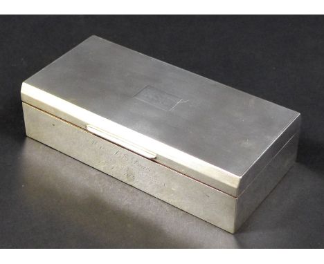 A George VI silver cigarette box, of rectangular form, with engine turned decoration to the top, monogram engraved 'L.S.P.', 