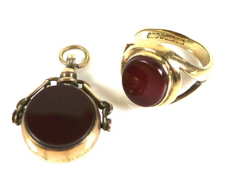 A gentleman's 9ct gold signet ring, with inset oval carnelian cabouchon, size J, 5.1g and a bloodstone and carnelian set 9ct 