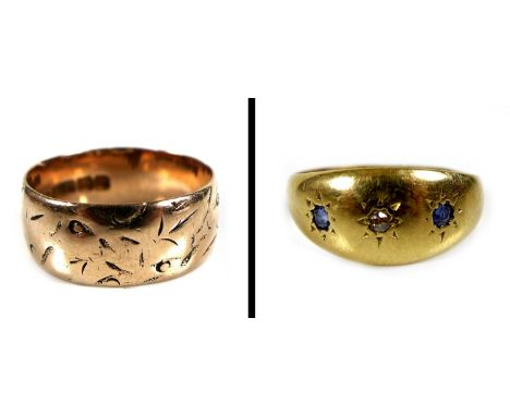 A small 14ct gold gypsy ring, set with a diamond brilliant and two sapphires, 2.8g, together with a 9ct gold wedding band, en