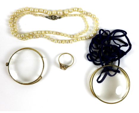 A 9ct gold cameo ring, size K, 1.3g, together with a small pearl necklace with white gold claps stamped '9ct', 46cm long, and
