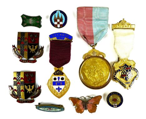 A group of three gold plated Masonic medals, comprising 'Cheshire Masonic Charities', 'Royal Masonic Institution For Girls', 