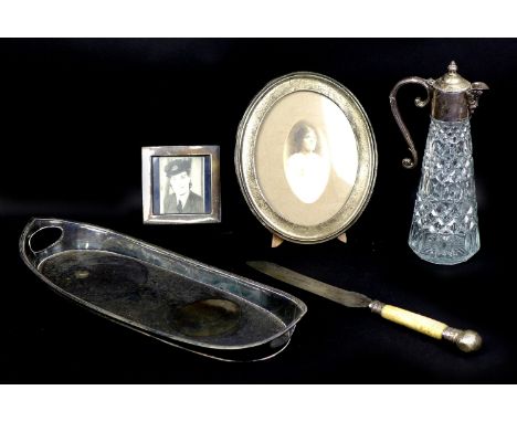 Two silver photograph frames and silver plated wares, comprising a George V oval silver photograph frame, Birmingham 1915, 20