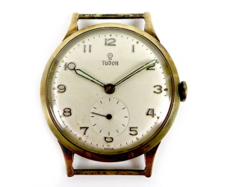 A Tudor 9ct gold cased gentleman's wristwatch head, circa 1960, circular silvered dial with raised silver Arabic numerals, re