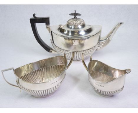 GEORGE V SILVER THREE PIECE TEA SERVICE - Birmingham 1909 and 1910, Maker Samuel F Evans &amp; Co consisting of teapot, sugar