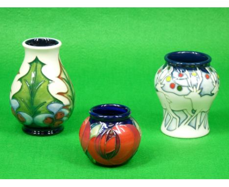 MOORCROFT 'Red Rose, Holly and Berry and Lapland vases' - the first being Cobalt ground by Emma Bossons, shape No 55/2, May 2