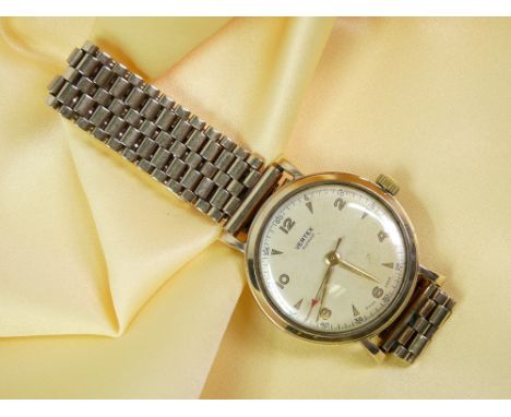 GENTLEMAN'S VERTEX ALLPROOF 9CT GOLD PRESENTATION WATCH &amp; STRAP - champagne coloured dial with Arabic and arrow markers, 