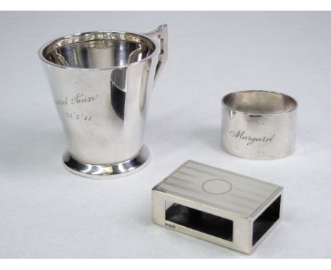 SMALL SILVER PARCEL - a plain tapered tankard inscribed 'Margaret Ann 25 05 41, 3.9ozs, Birmingham 1939 (impact dent in the b