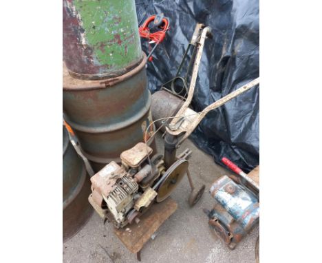 A petrol rotavator &amp; a garden roller (handle broken) A/F.&nbsp;Collect Only.