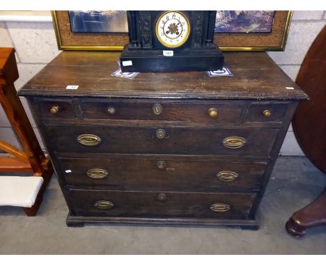 An early Victorian oak three over three chest of drawers. COLLECT ONLY.