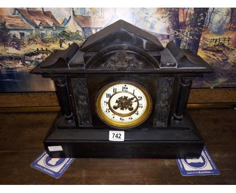 An old style mantel clock, springs ok. (no key or pendulum)