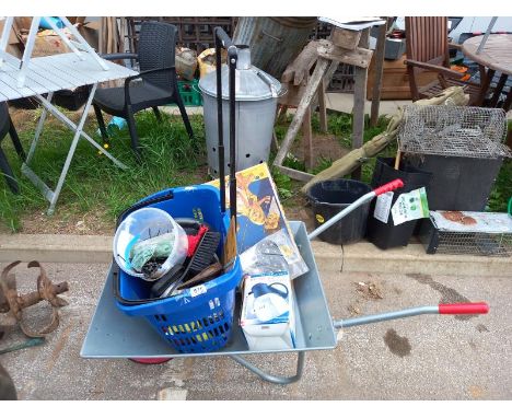 A wheelbarrow with quantity of tools etc.&nbsp;Collect Only.