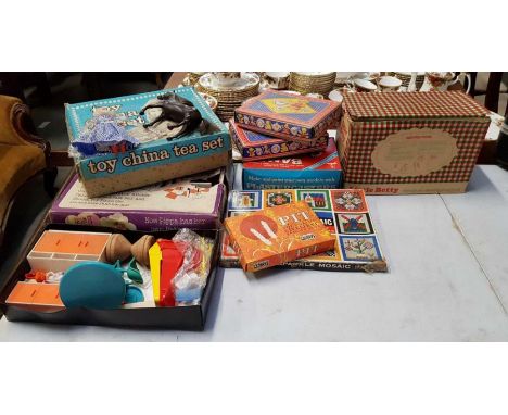 A collection of vintage games including Pippa's kitchen fittings, toy china tea set, Little Betty miniature sewing machine an