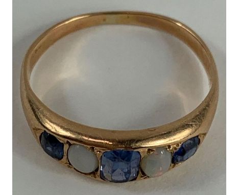 An early 20th century sapphire and opal five stone ring, 2.4 grams gross