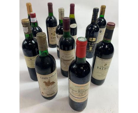 Twelve bottles of vintage and other red wines