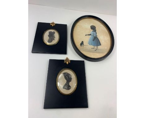 A Victorian portrait of a girl and her cat, 19.9cm x 15.5cm; together with a pair of portrait miniatures of a lady and a gent