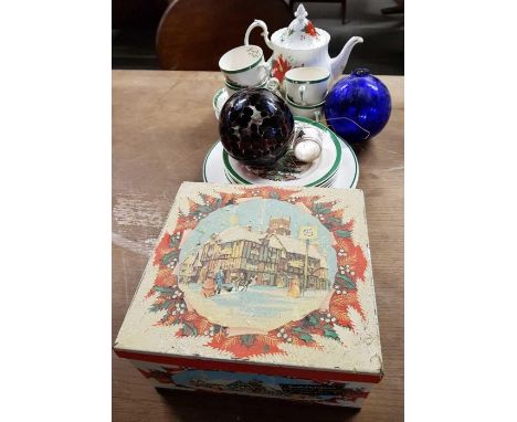 A Royal Albert "Poinsettia" pattern teapot, along with Spode Christmas Tree plates and other items