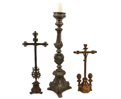consisting of 2 standing crucifixes and an altar candlestick, height 106 cm.