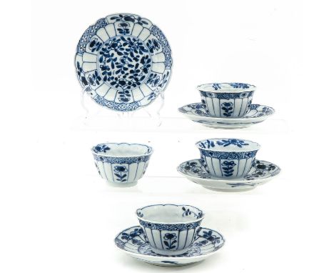 Floral decor, saucers are 11 cm. in diameter, hairline.